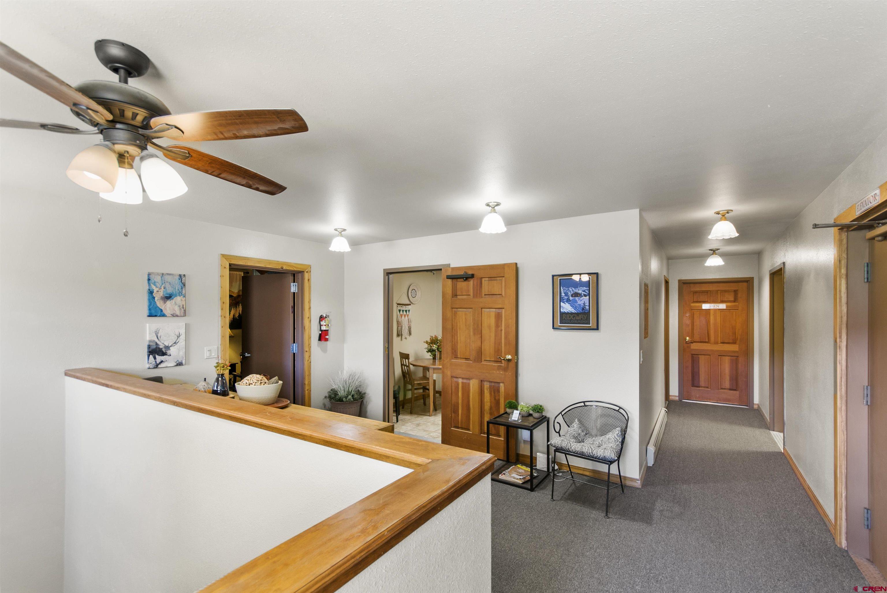 112 Village Square West Ridgway, CO 81432 - Photo 11 of 16 a living room with furniture and a table
