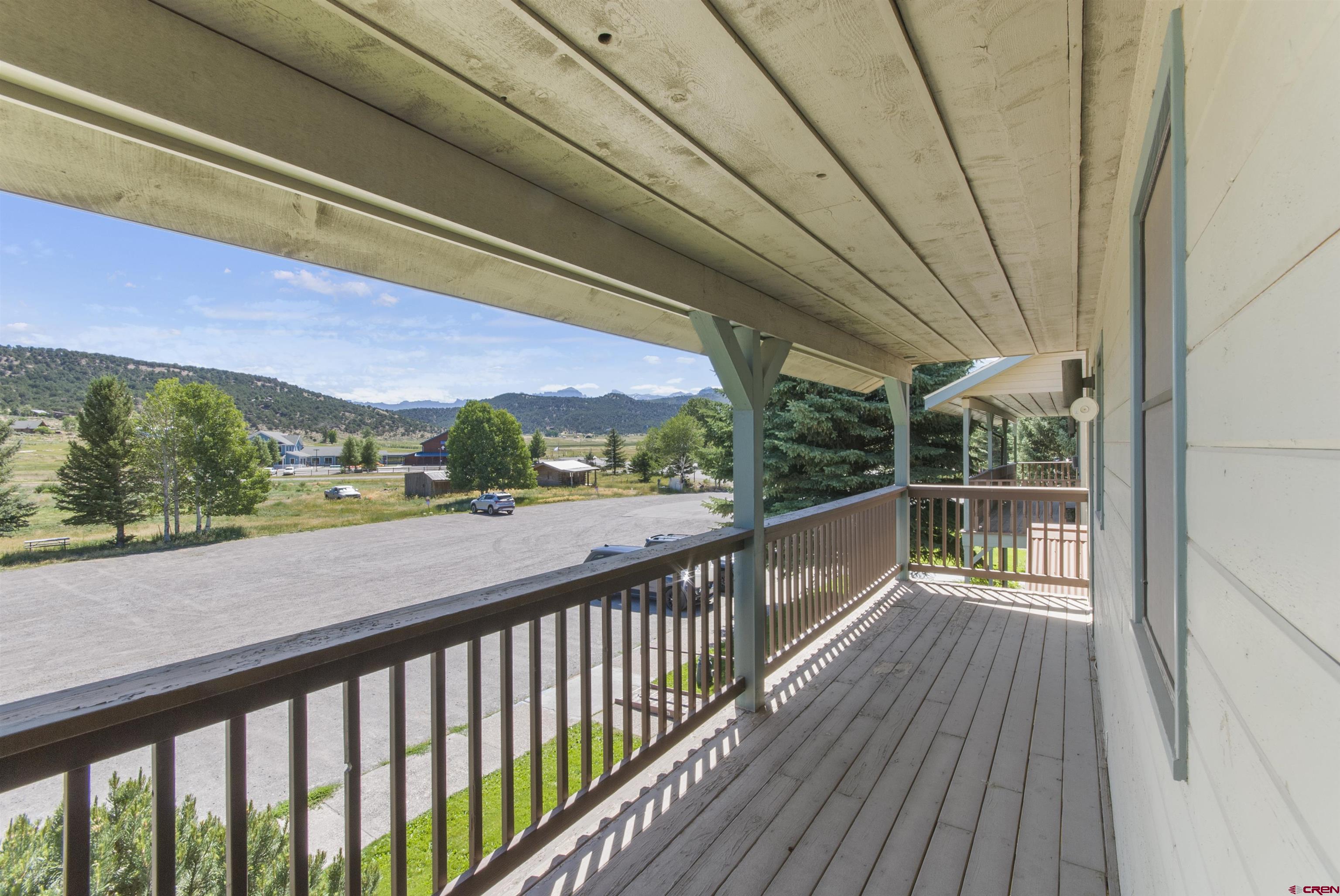 112 Village Square West Ridgway, CO 81432 - Photo 16 of 16 a view of a balcony with wooden floor