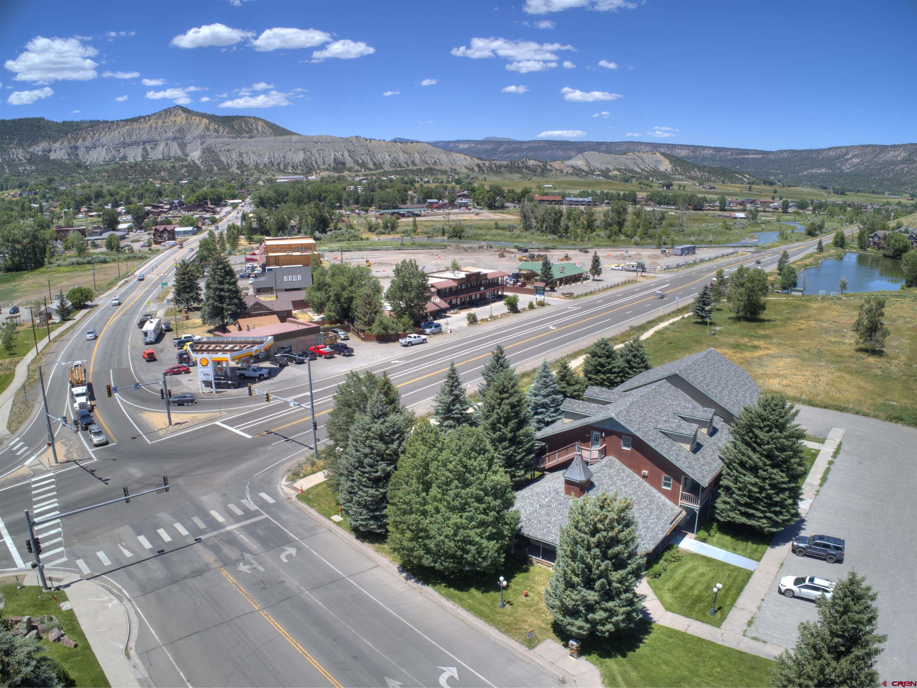 112 Village Square West Ridgway, CO 81432 - Photo 3 of 16 an aerial view of a swimming pool patio and mountain view