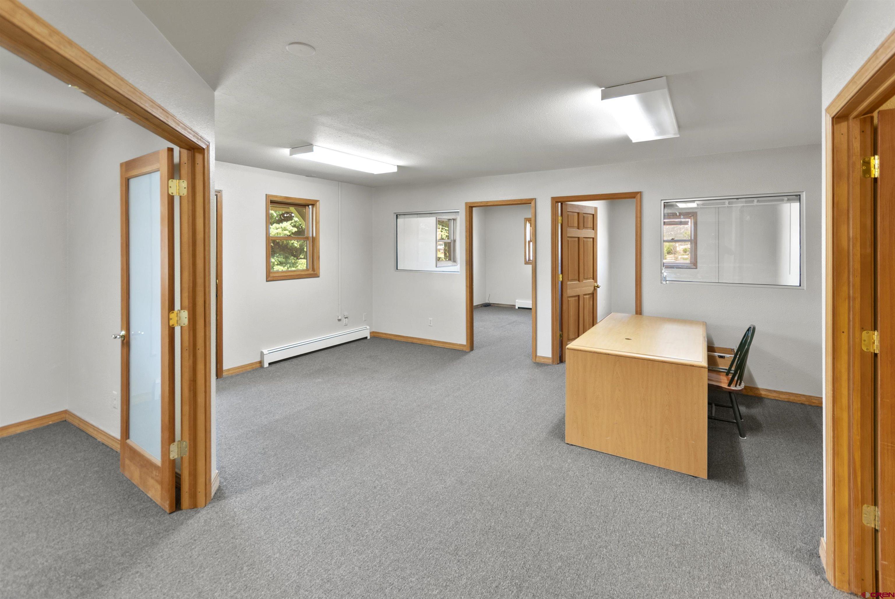 112 Village Square West Ridgway, CO 81432 - Photo 9 of 16 a living room with furniture and a window