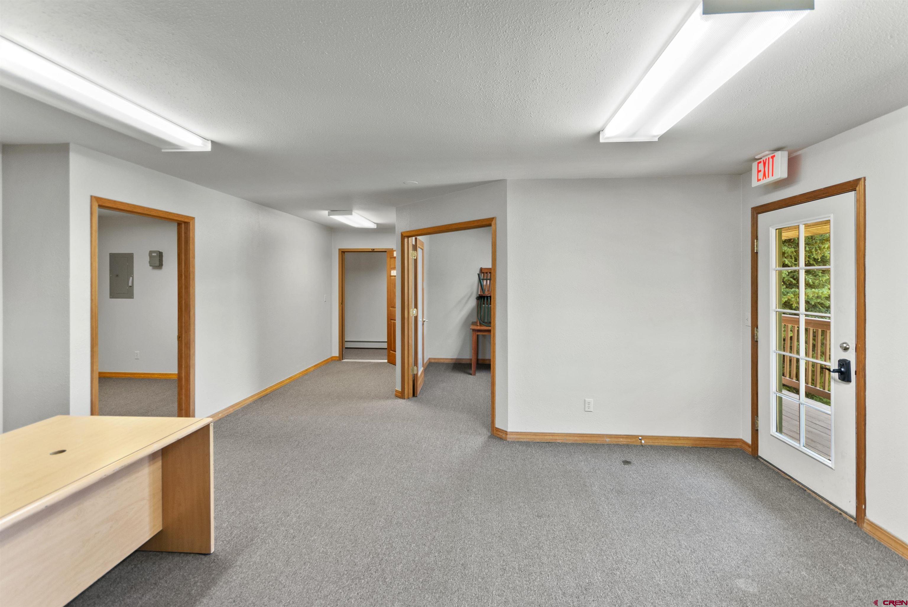 112 Village Square West Ridgway, CO 81432 - Photo 10 of 16 a view of an empty room with a window