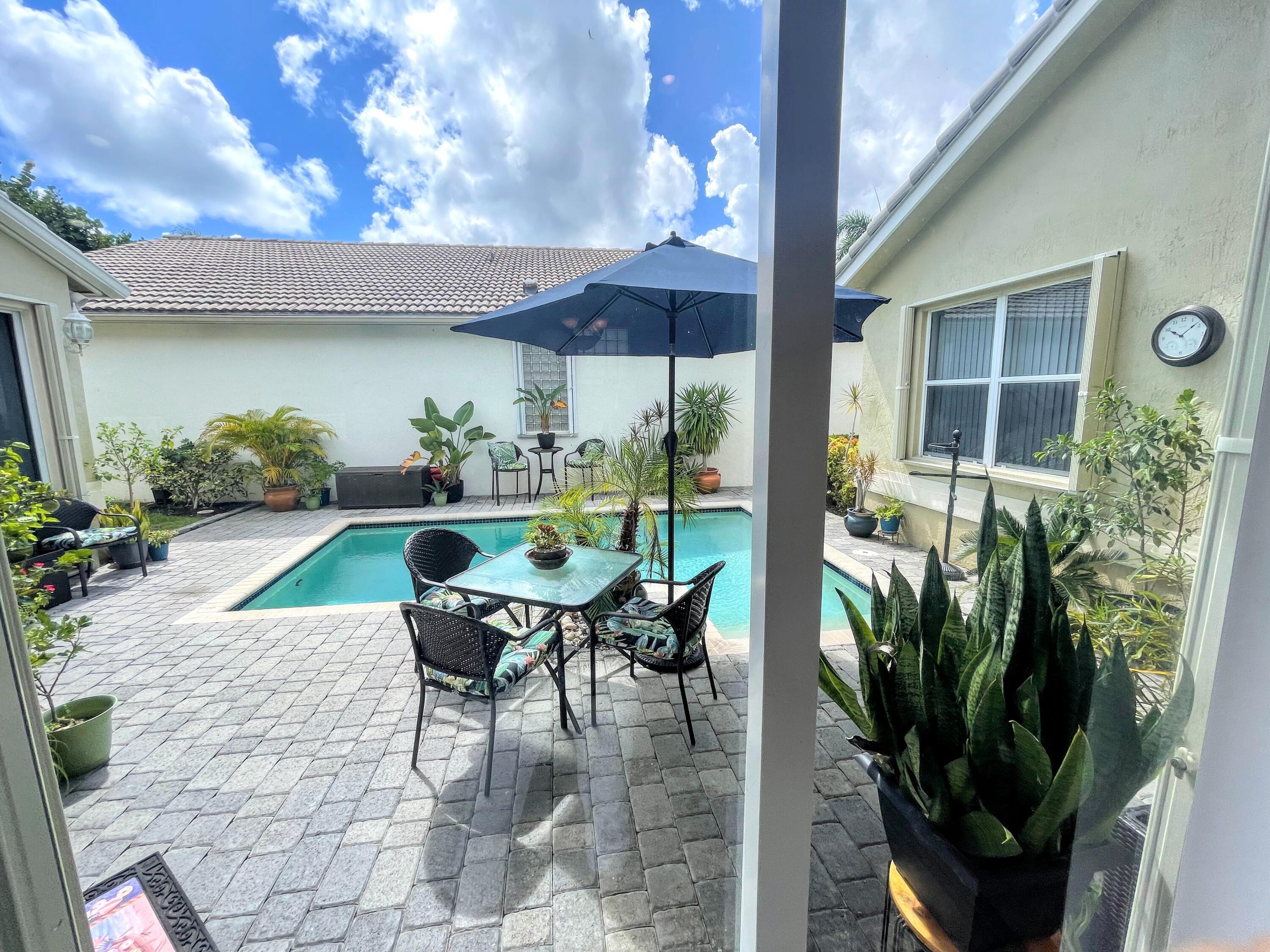 7060 Northwest Turtle Walk Boca Raton, FL 33487 - Photo 9 of 51 Courtyard