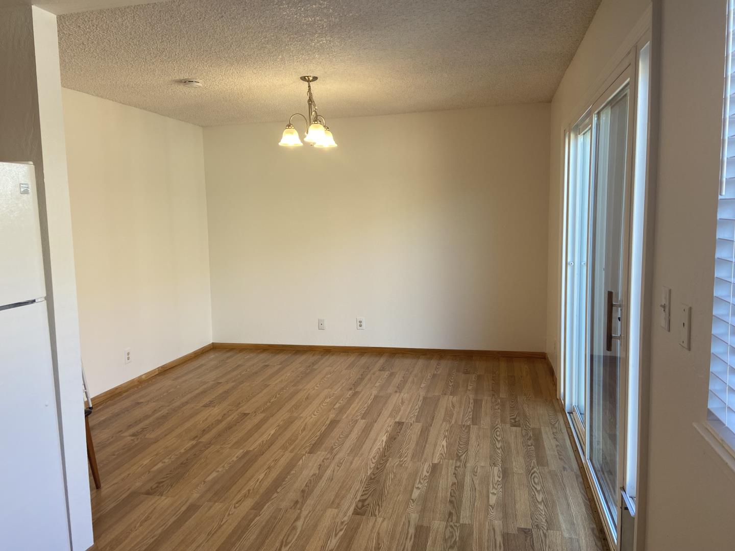 715 Comet Drive Foster City, CA 94404 - Photo 11 of 25 a view of empty room with wooden floor