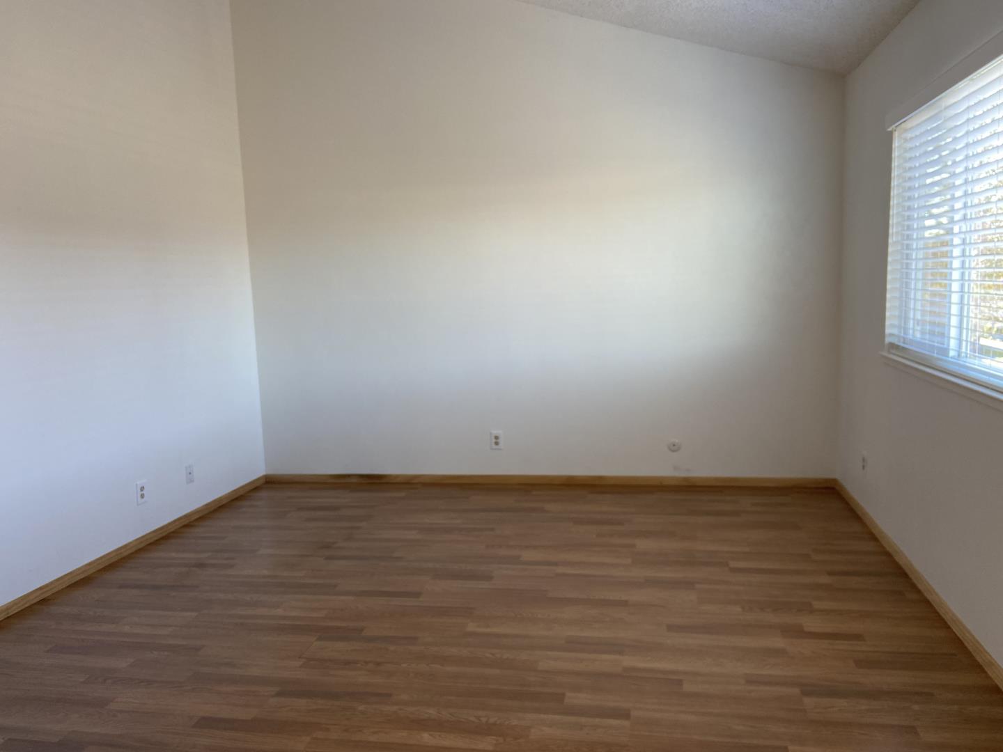 715 Comet Drive Foster City, CA 94404 - Photo 14 of 25 a view of an empty room and window