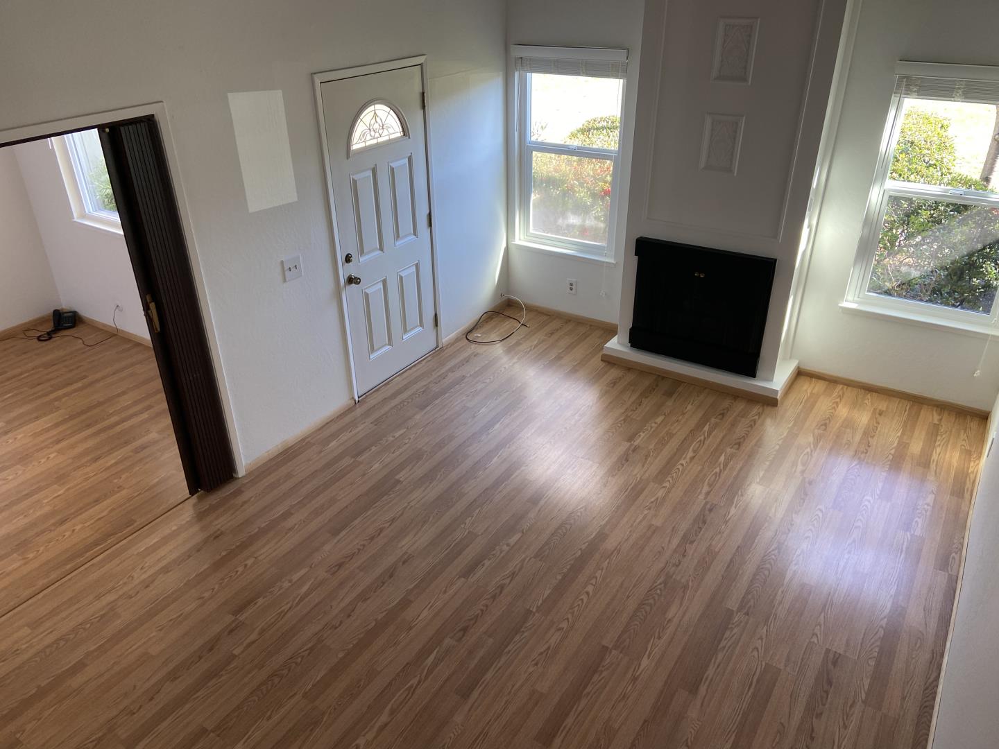 715 Comet Drive Foster City, CA 94404 - Photo 4 of 25 a view of empty room with wooden floor and fan