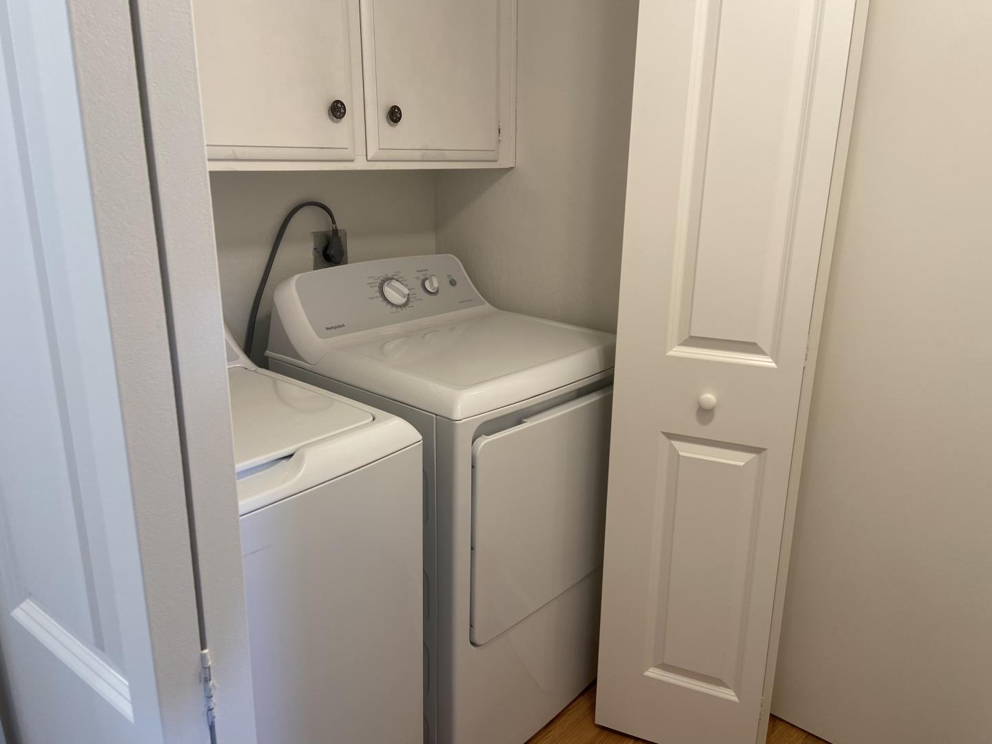 715 Comet Drive Foster City, CA 94404 - Photo 7 of 25 a utility room with dryer and washer