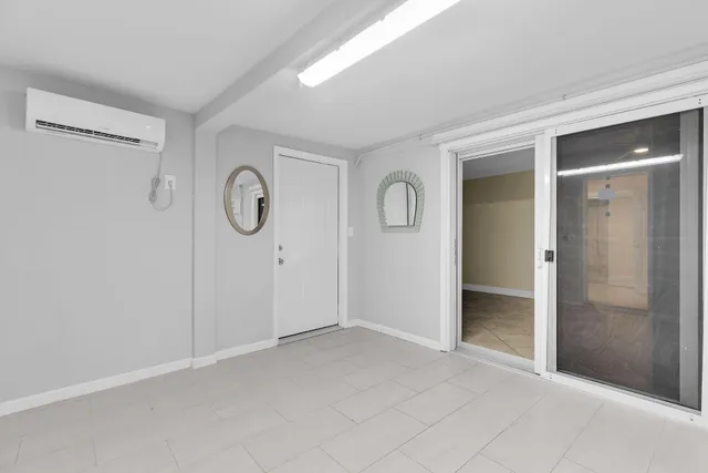 a view of a room with an empty space