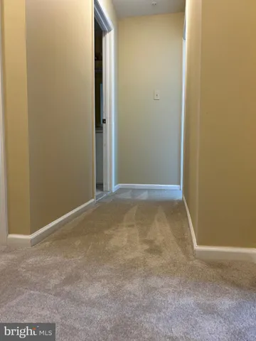 a view of room with refrigerator