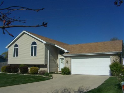 8799 Calhoun Place Crown Point, IN 46307 - Photo 1 of 10 a front view of a house with garden