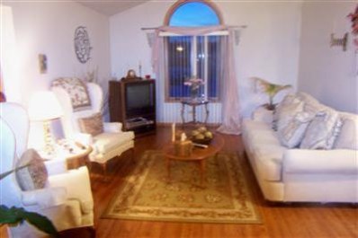8799 Calhoun Place Crown Point, IN 46307 - Photo 6 of 10 a living room with furniture