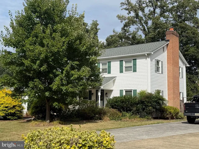a room with a bed and a window