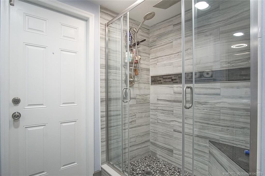2409 Elizabeth Avenue Fort Pierce, FL 34981 - Photo 11 of 30 a bathroom with a shower