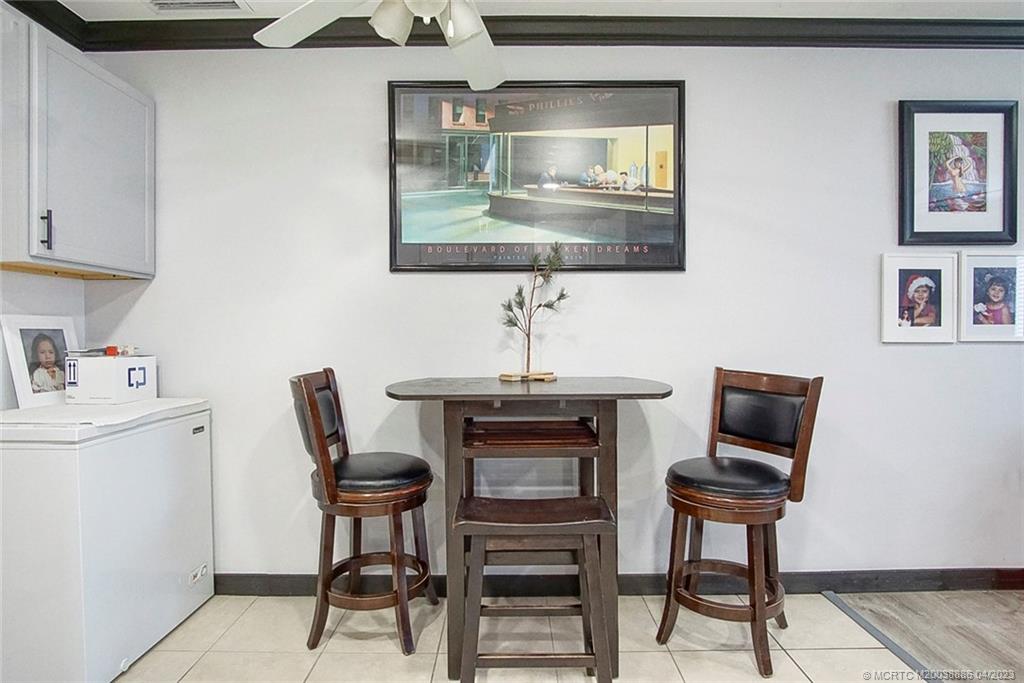 2409 Elizabeth Avenue Fort Pierce, FL 34981 - Photo 8 of 30 a dining room with furniture and window