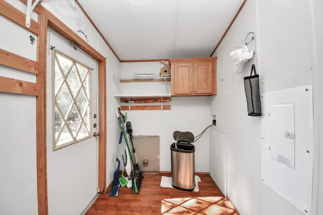 a en suite bathroom with a double vanity sink a mirror and a shower