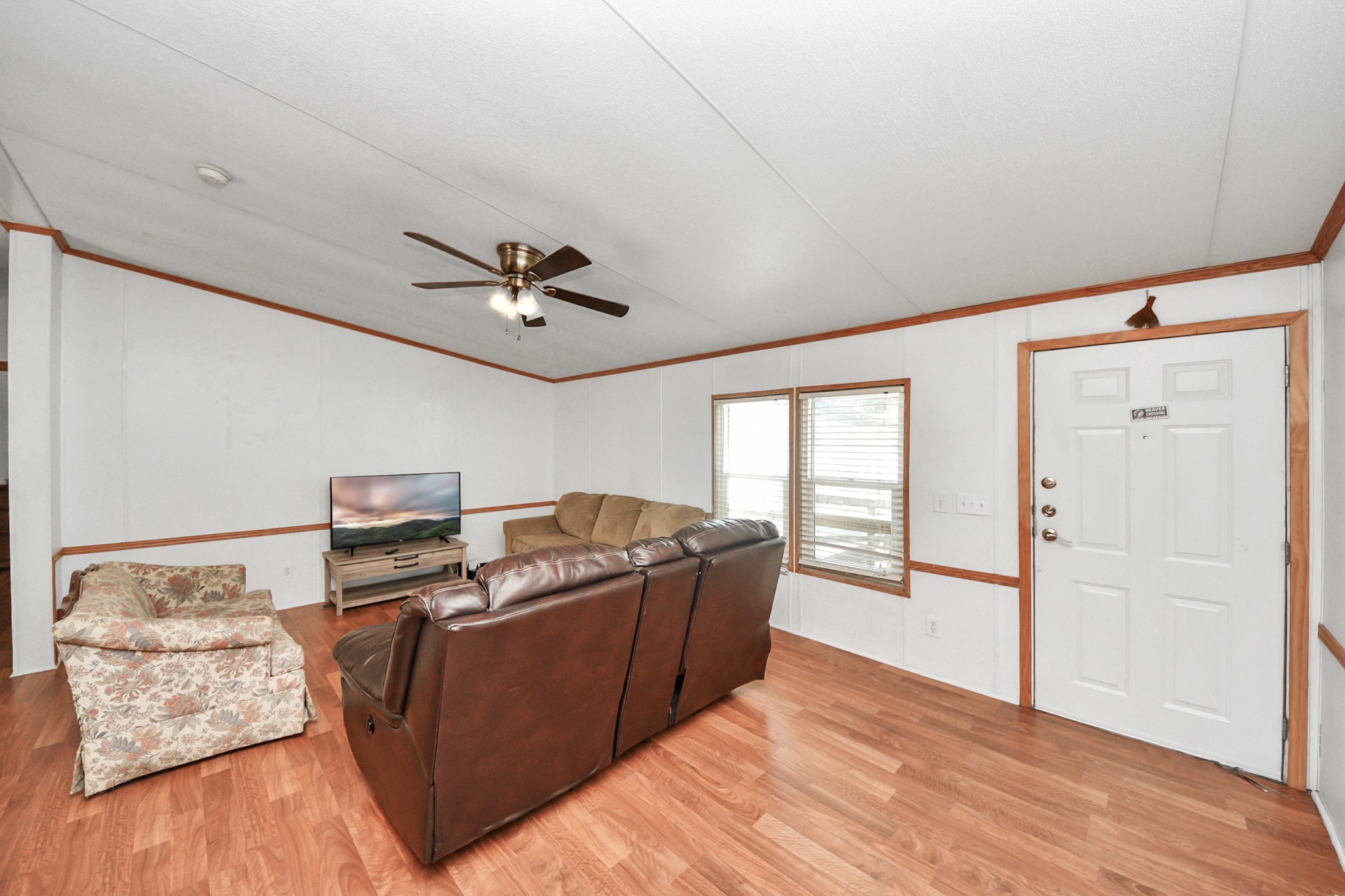 16338 Hill Country Court Conroe, TX 77302 - Photo 5 of 39 a living room with furniture and a window
