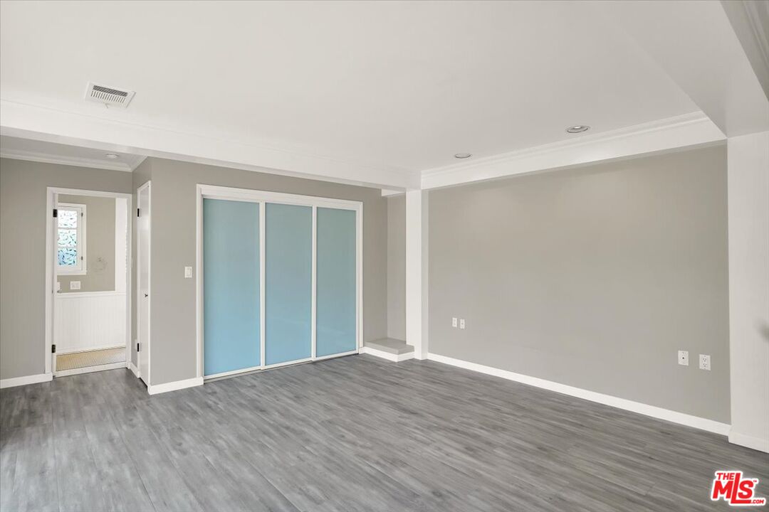 2270 Brigden Road Pasadena, CA 91104 - Photo 30 of 43 a view of an empty room with wooden floor
