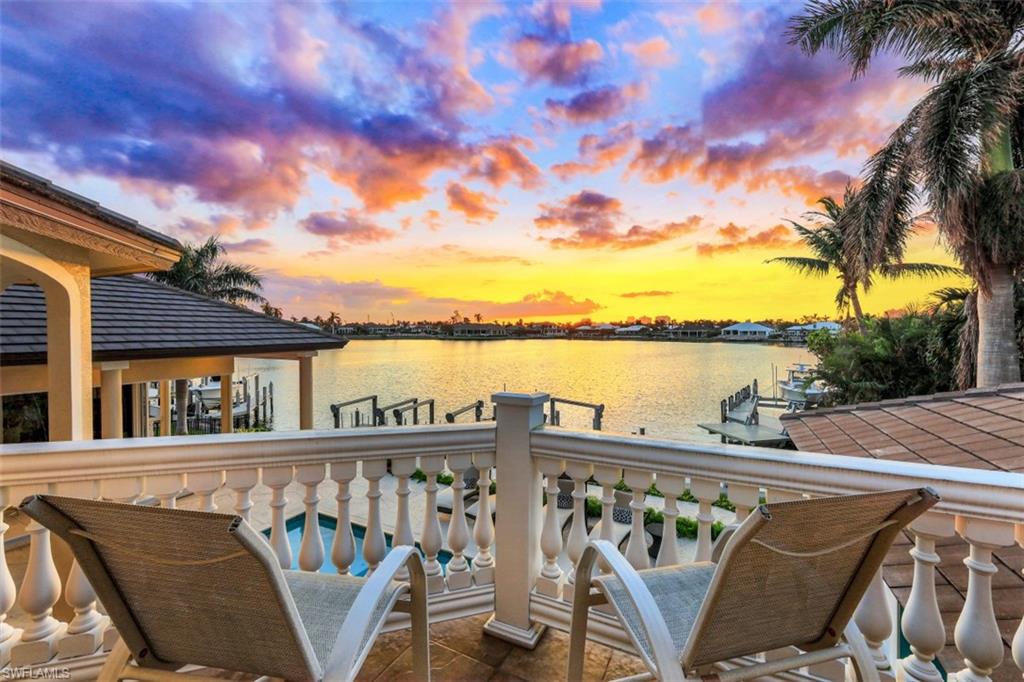 856 Inlet Drive Marco Island, FL 34145 - Photo 18 of 35 a view of a balcony with lake view and mountain view