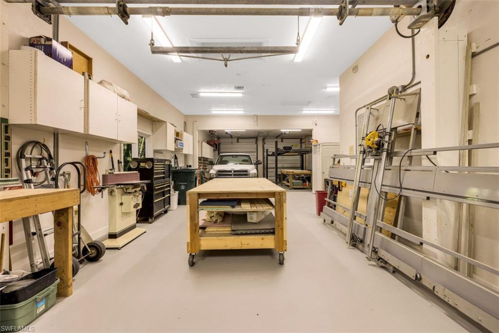 856 Inlet Drive Marco Island, FL 34145 - Photo 29 of 35 a view of parking garage with cars