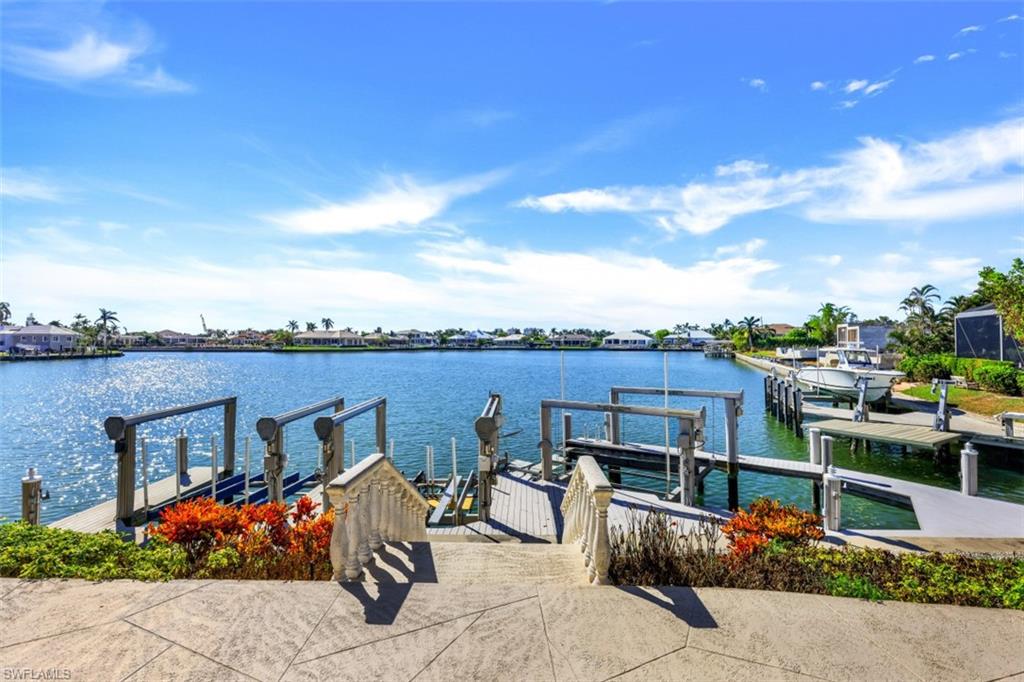 856 Inlet Drive Marco Island, FL 34145 - Photo 30 of 35 a view of a terrace with sitting area