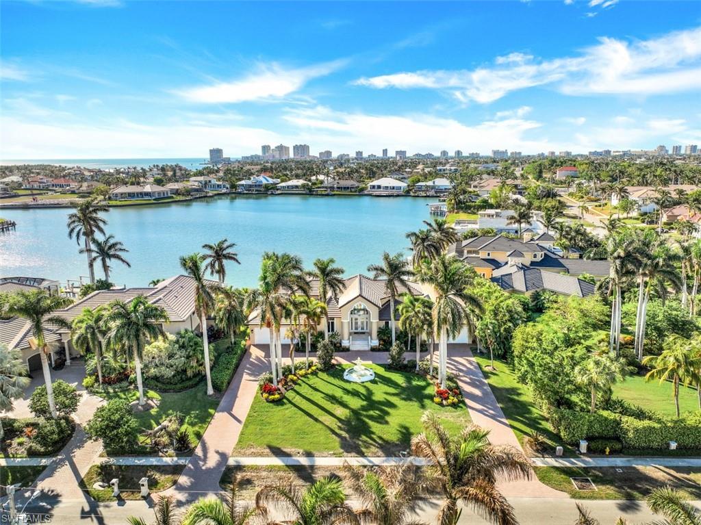 856 Inlet Drive Marco Island, FL 34145 - Photo 33 of 35 a view of a lake with a city