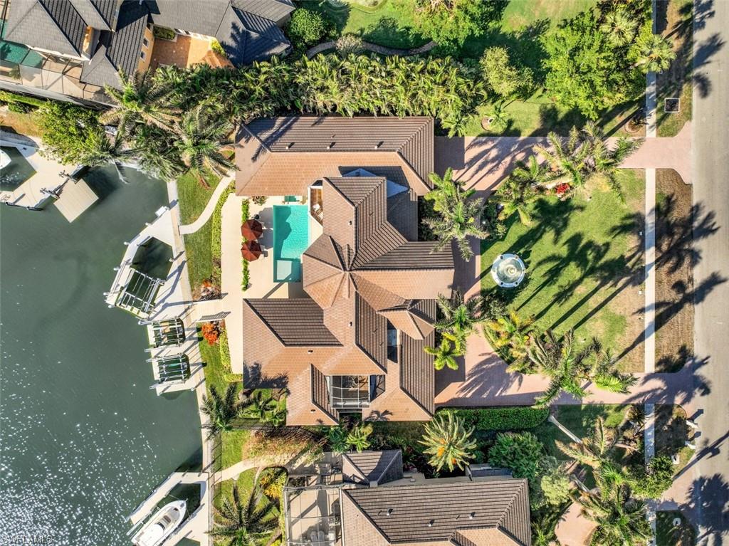 856 Inlet Drive Marco Island, FL 34145 - Photo 34 of 35 an aerial view of a house with a yard and garden