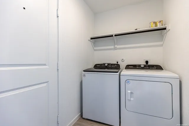 a utility room with dryer and washer