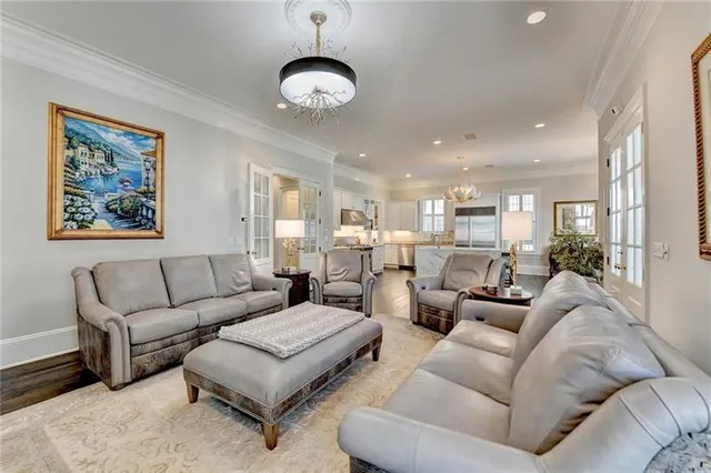 a bathroom with a granite countertop sink a mirror and a shower