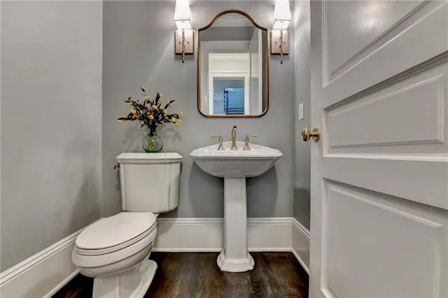 a room with furniture pool table and window