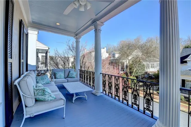 a view of a building with furniture