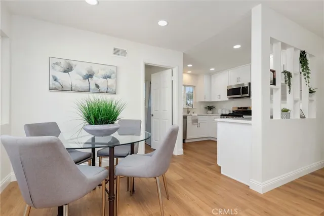 a kitchen with a stove microwave and a refrigerator