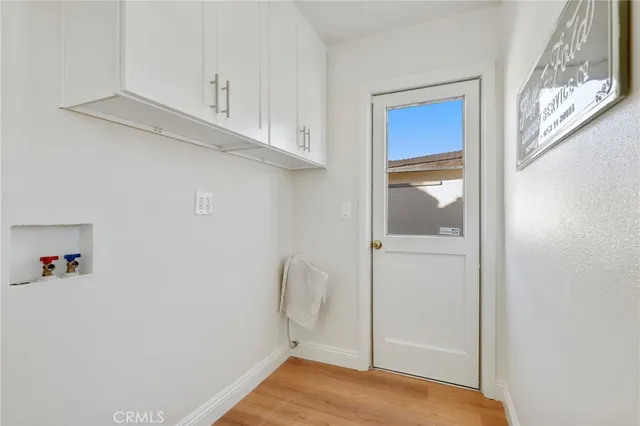 a view of an empty room with wooden roof