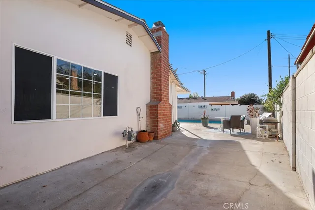 a very nice looking house with a large window