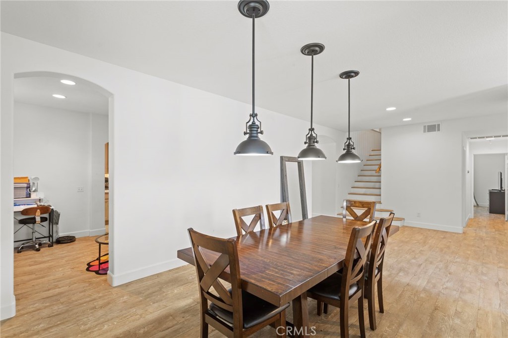 31500 Britton Circle Temecula, CA 92591 - Photo 14 of 44 a view of a dining room with furniture and wooden floor