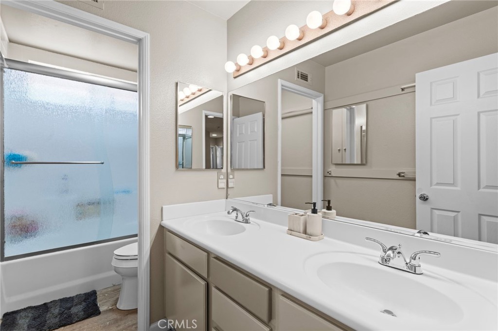 31500 Britton Circle Temecula, CA 92591 - Photo 18 of 44 a bathroom with a sink a toilet and shower