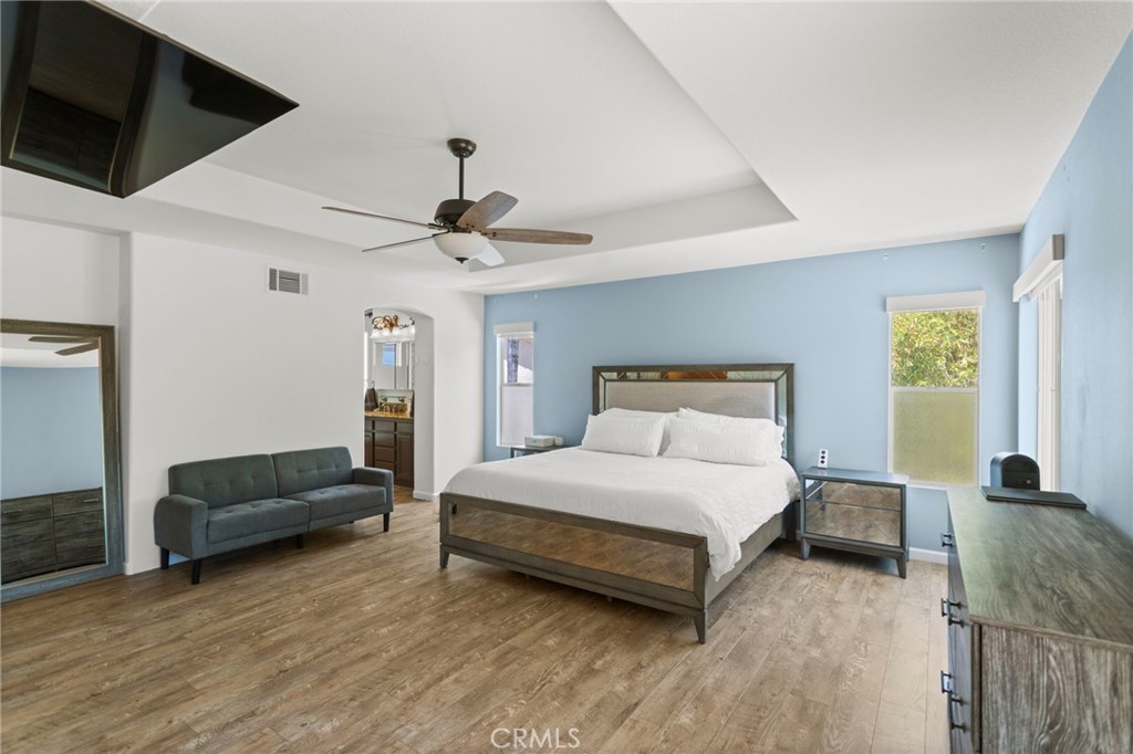 31500 Britton Circle Temecula, CA 92591 - Photo 24 of 44 a bedroom with a bed and a couch