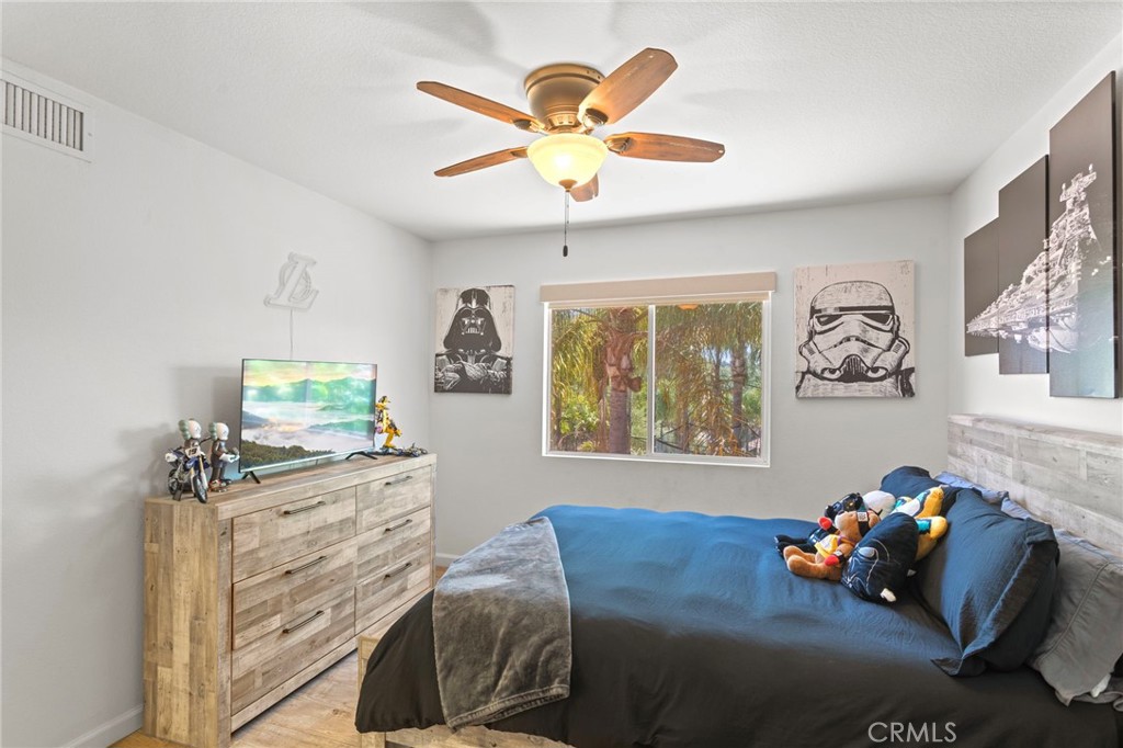 31500 Britton Circle Temecula, CA 92591 - Photo 29 of 44 a bedroom with furniture and a bed