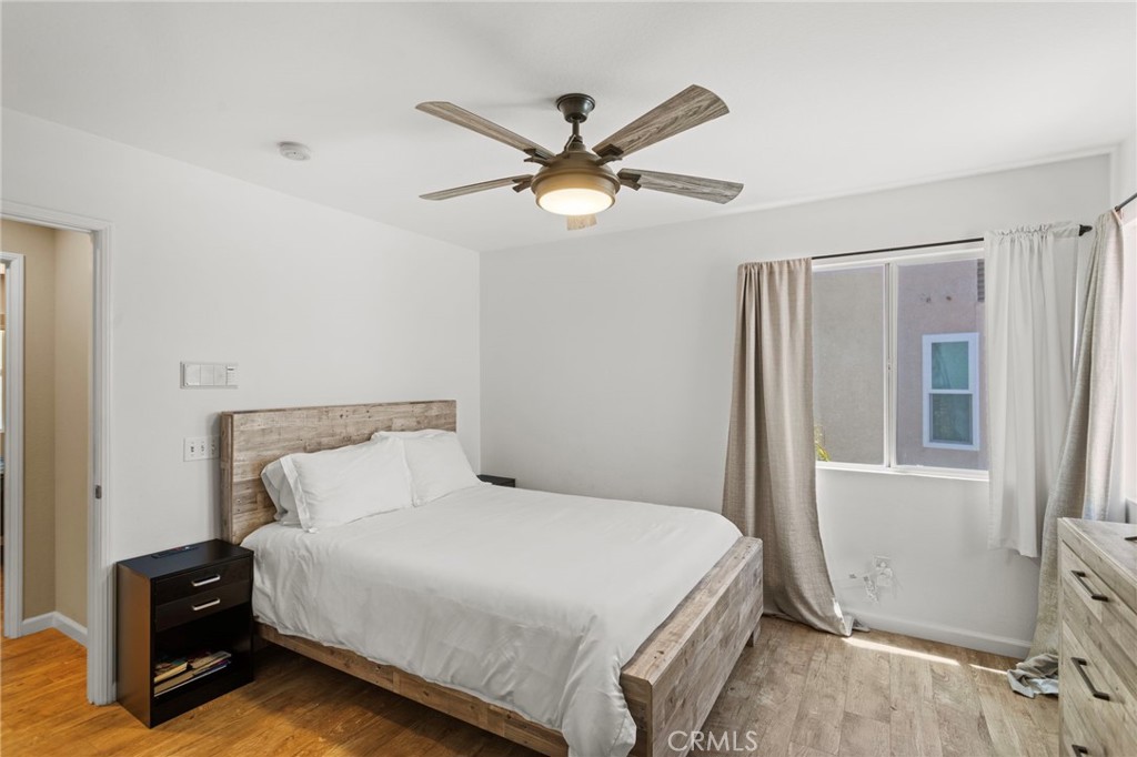 31500 Britton Circle Temecula, CA 92591 - Photo 31 of 44 a bedroom with a bed and window