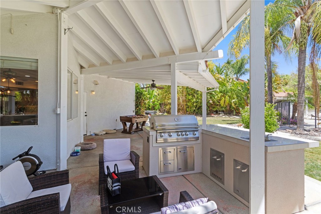 31500 Britton Circle Temecula, CA 92591 - Photo 34 of 44 a living room with furniture and a fireplace