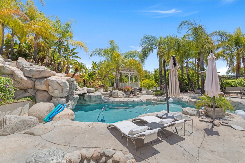31500 Britton Circle Temecula, CA 92591 - Photo 38 of 44 a view of a patio with swimming pool