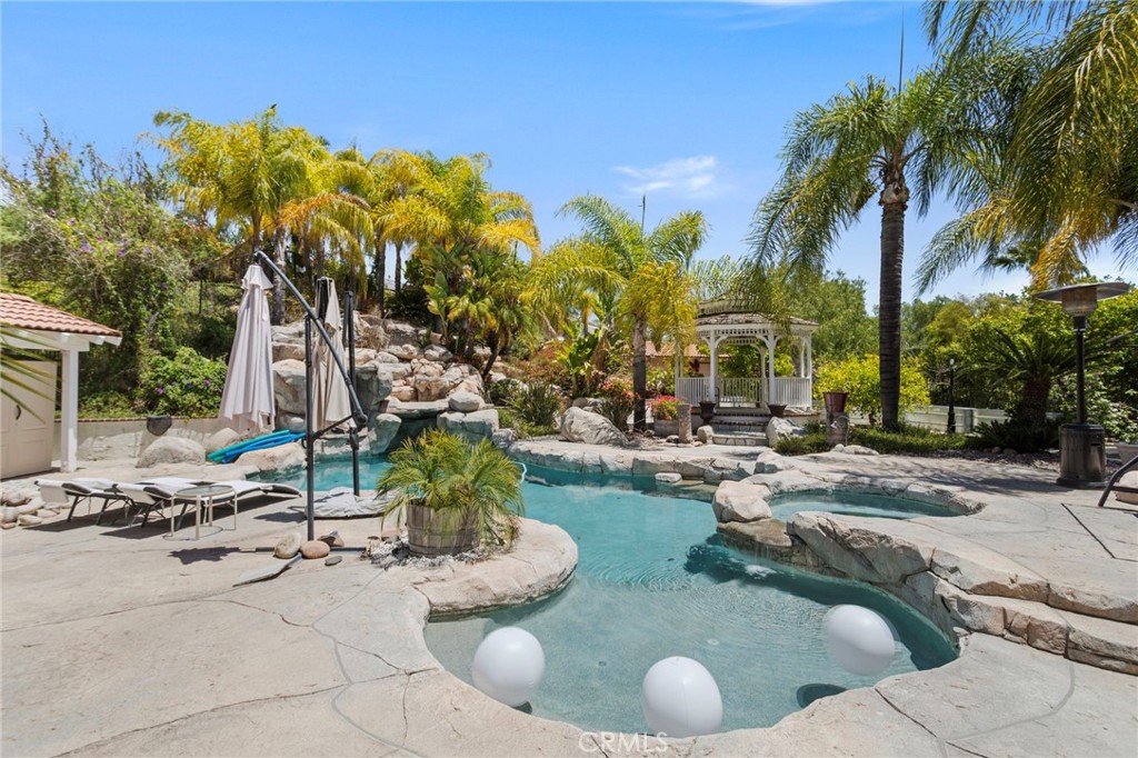 31500 Britton Circle Temecula, CA 92591 - Photo 40 of 44 a view of a backyard house and swimming pool