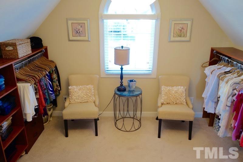 1908 Falls Farm Crossing Raleigh, NC 27614 - Photo 15 of 25 a living room with furniture and a window