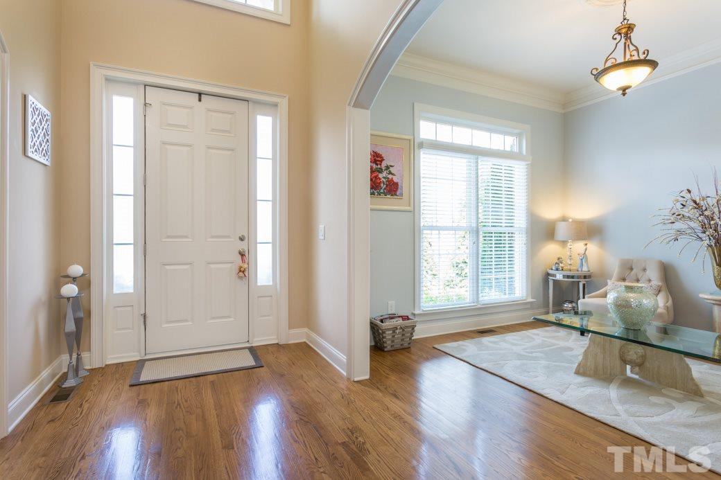 1908 Falls Farm Crossing Raleigh, NC 27614 - Photo 3 of 25 a view of a room with wooden floor