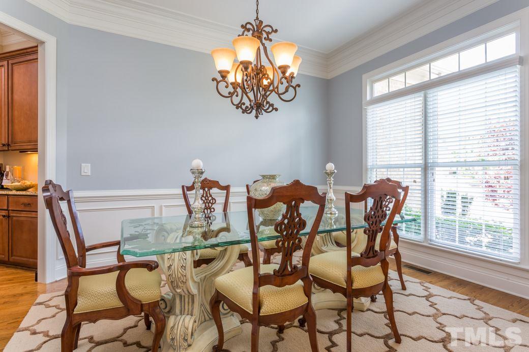 1908 Falls Farm Crossing Raleigh, NC 27614 - Photo 5 of 25 a dining room with furniture and window