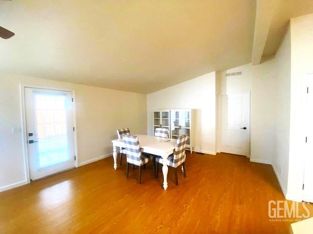 Undisclosed Address Paso Robles, CA 93446 - Photo 11 of 38 a view of a dining room with furniture and wooden floor