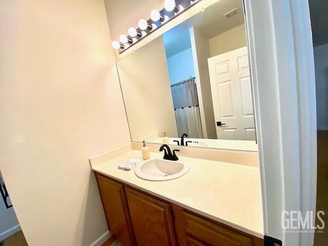 Undisclosed Address Paso Robles, CA 93446 - Photo 22 of 38 a bathroom with a sink and a mirror