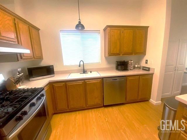 Undisclosed Address Paso Robles, CA 93446 - Photo 7 of 38 a kitchen with a sink a stove and cabinets