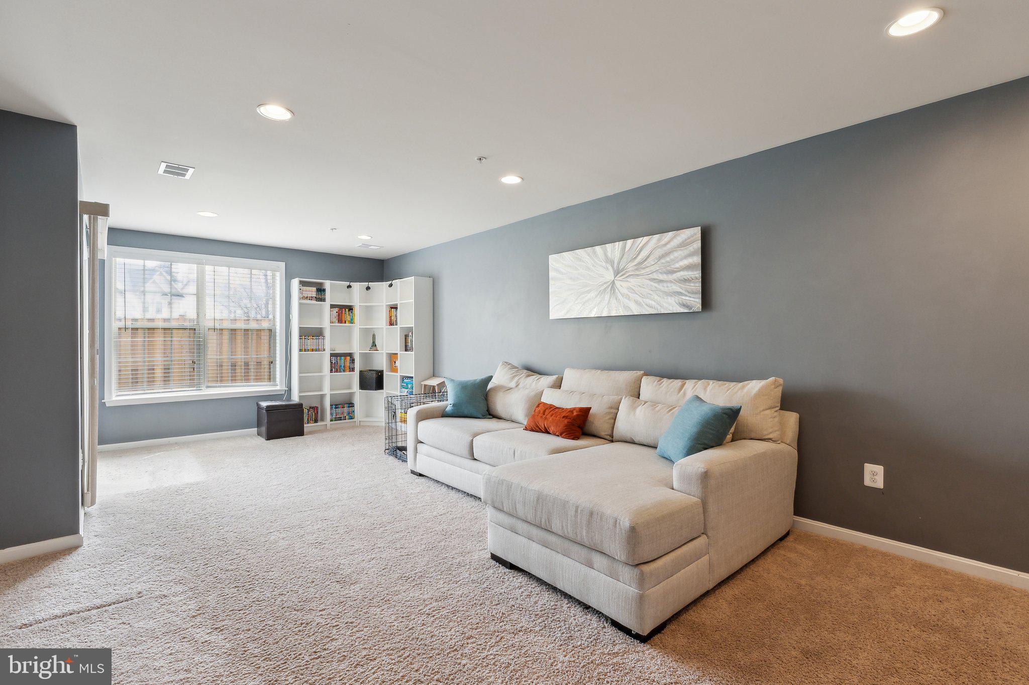 305 Hersden Lane Arnold, MD 21012 - Photo 12 of 23 a living room with furniture and a large window