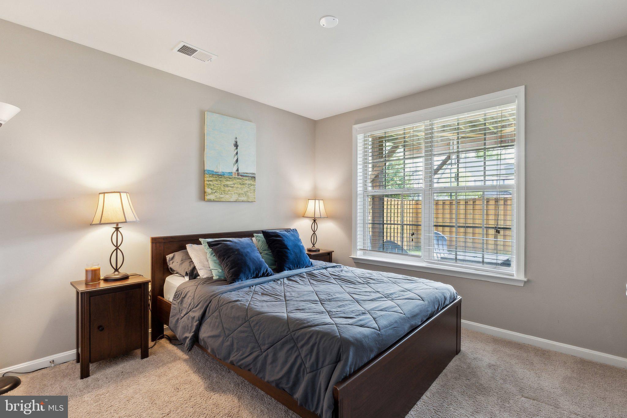 305 Hersden Lane Arnold, MD 21012 - Photo 14 of 23 a bedroom with double bed and a window