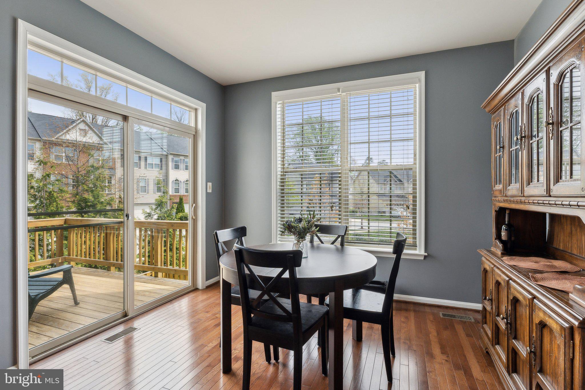 305 Hersden Lane Arnold, MD 21012 - Photo 6 of 23 a view of a dining room with furniture window and wooden floor