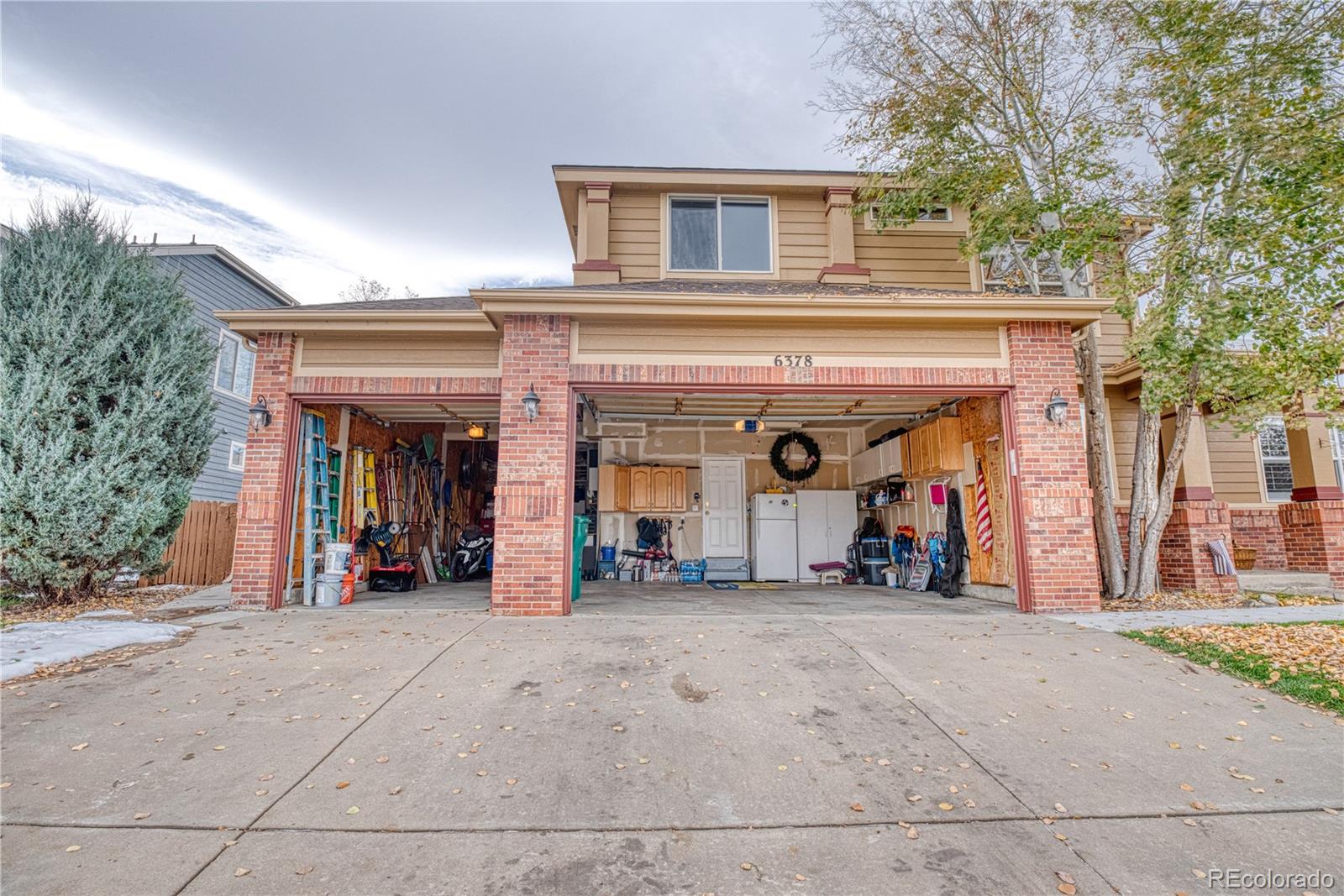 6378 Umber Circle Arvada, CO 80403 - Photo 13 of 50 a view of a building with sitting area